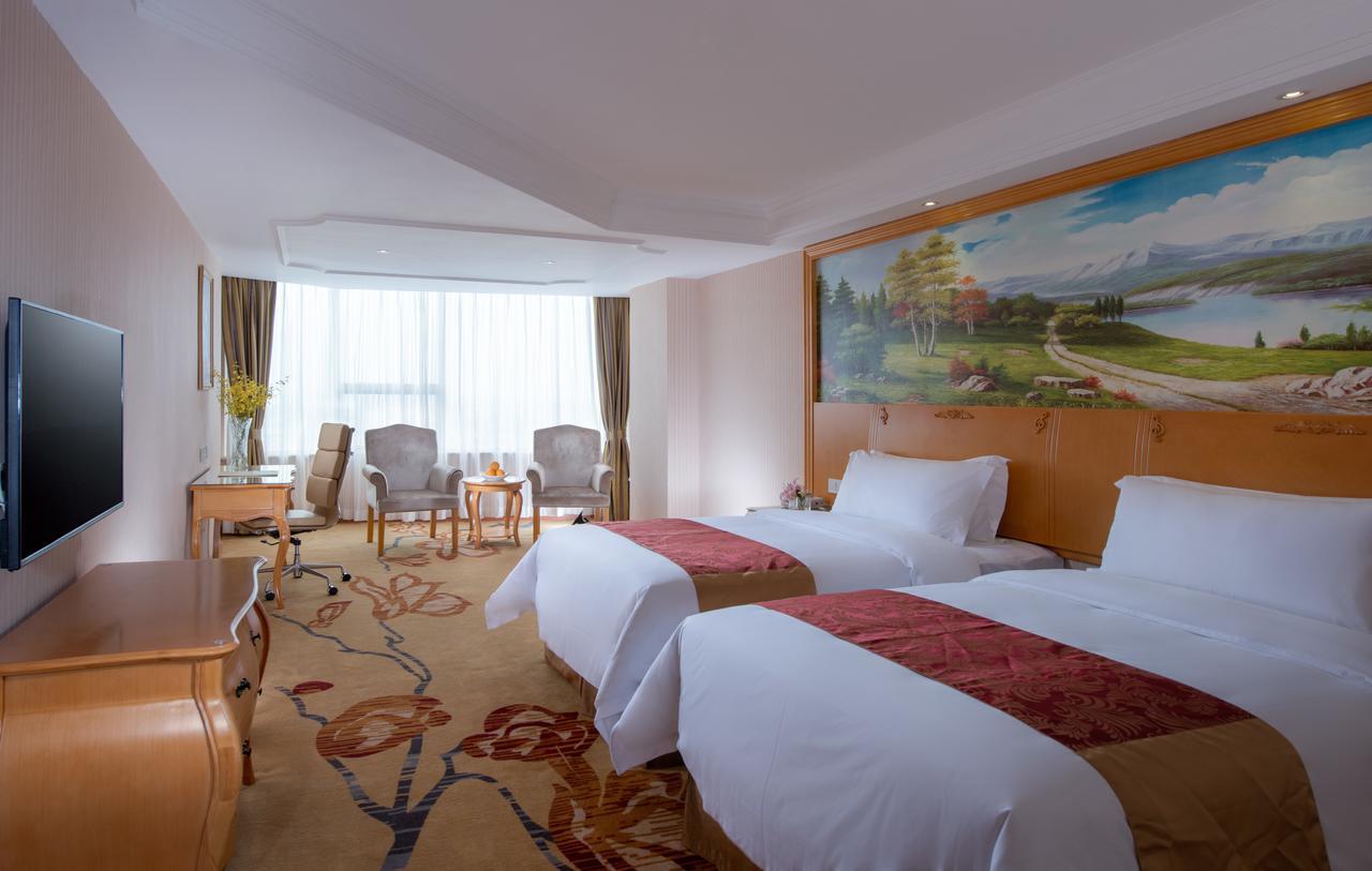 Vienna International Hotel Ningbo City Xixin Tiandi Exterior photo